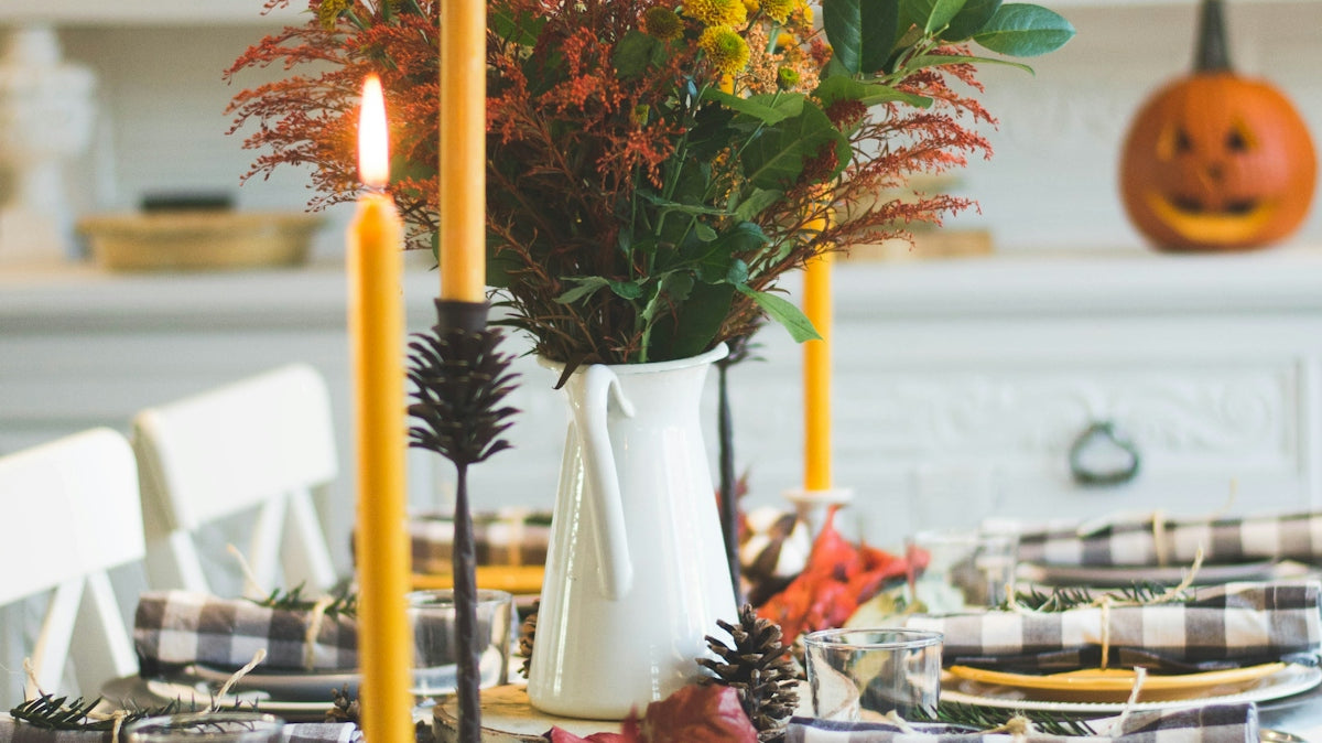 shallow focus photo of yellow lighted candles