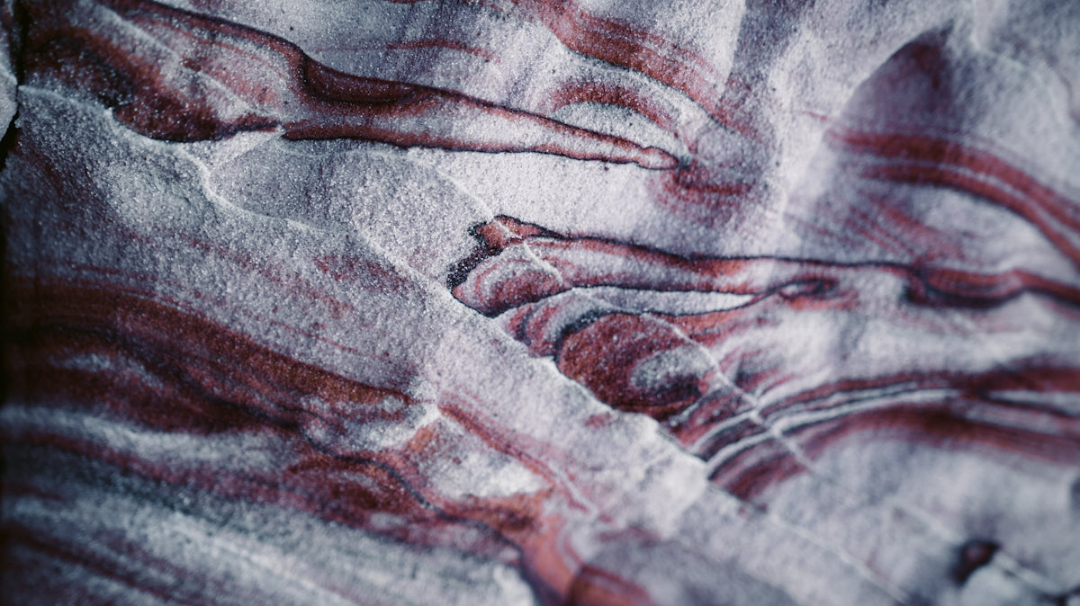 a close up of a piece of paper with a painting on it