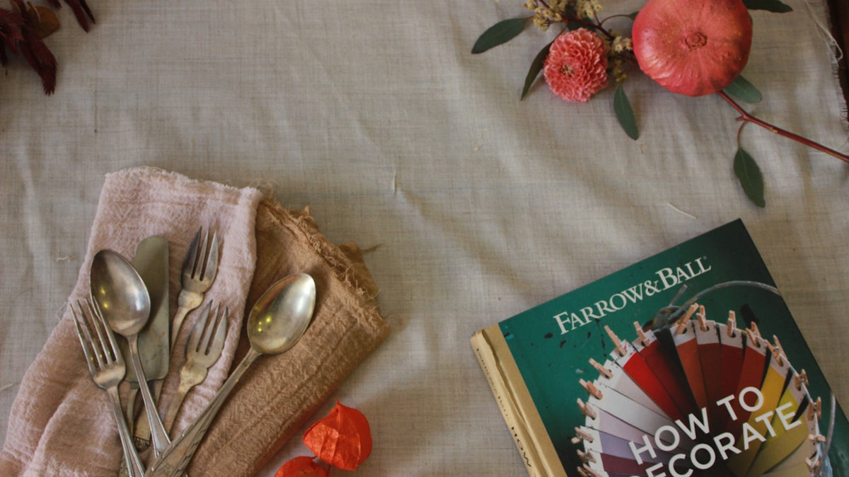 green and white book on white textile