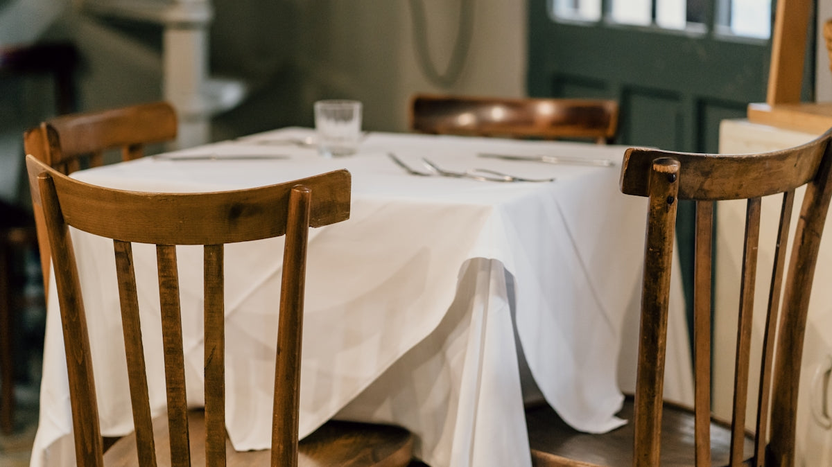 brown wooden chair beside table