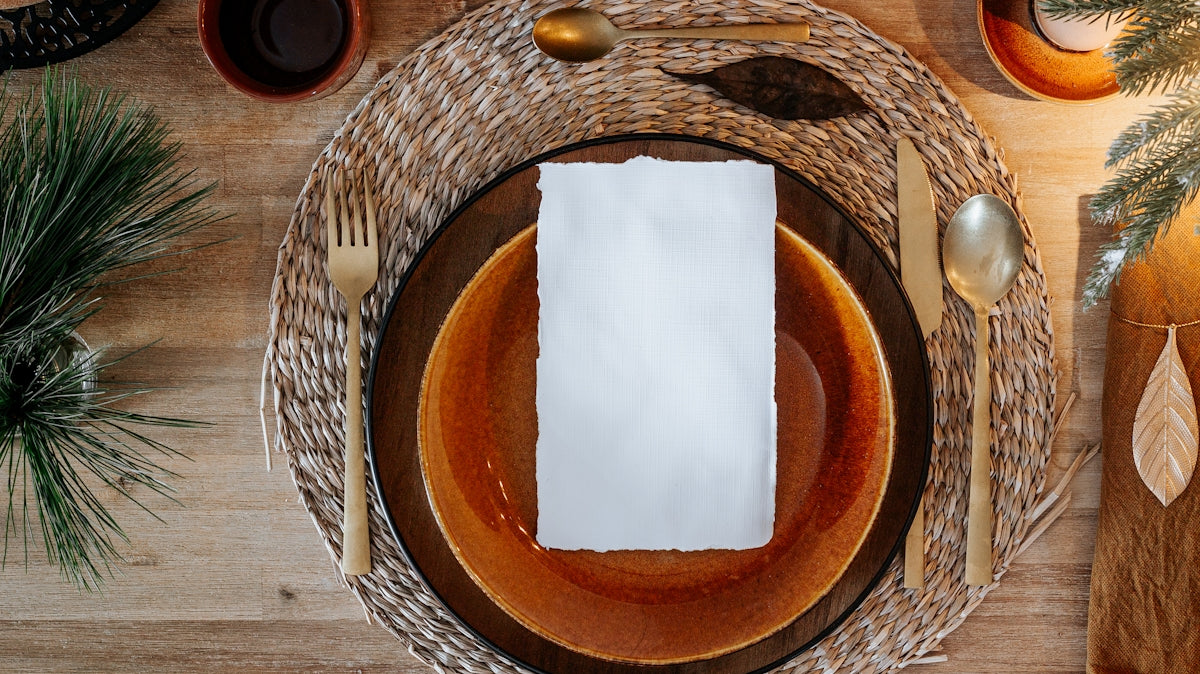 brown and white paper on brown woven round basket
