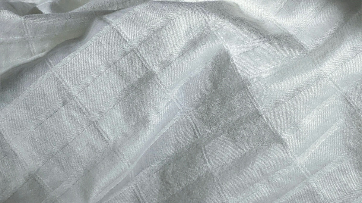 white and blue bed linen