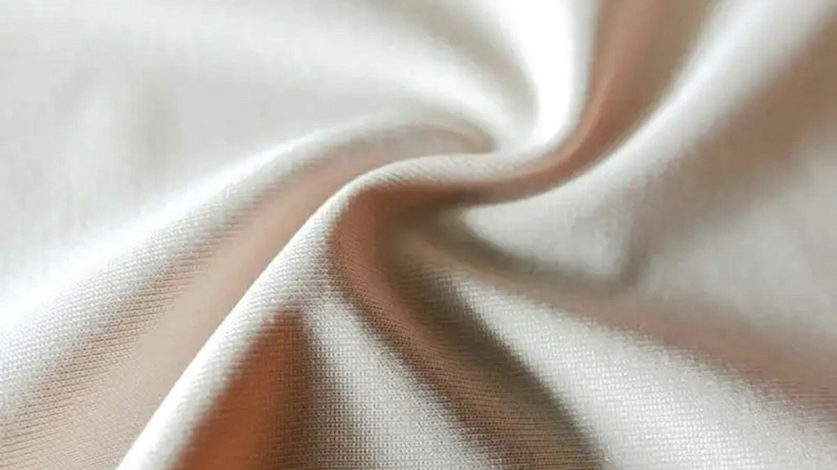 a close up view of a white fabric