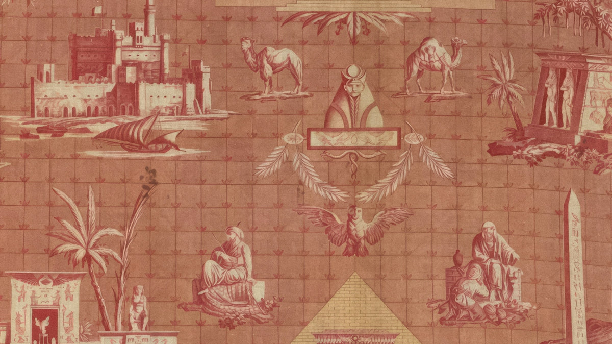 a red and beige wallpaper with a pyramid design
