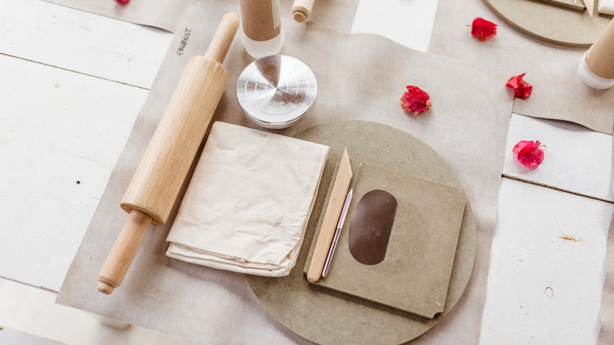 A table topped with lots of different types of paper