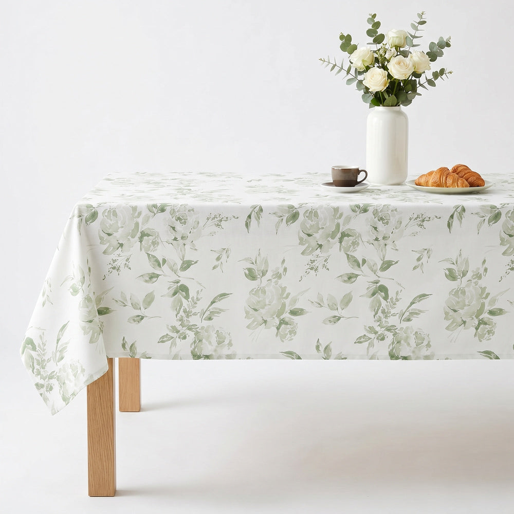 Floral Tablecloth featuring green leaves, perfect for elegant dining settings.