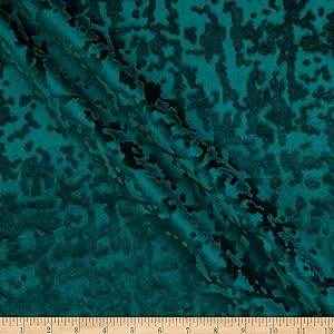 Teal Batik Fabric features a textured pattern with dark accents, perfect for quilting and crafts.