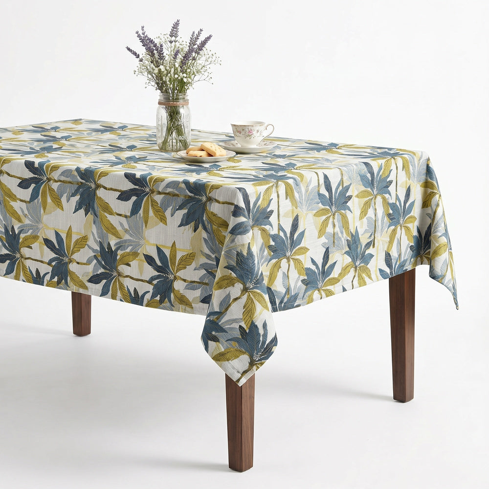 Leafy Tablecloth featuring vibrant green and blue patterns, perfect for dining decor.