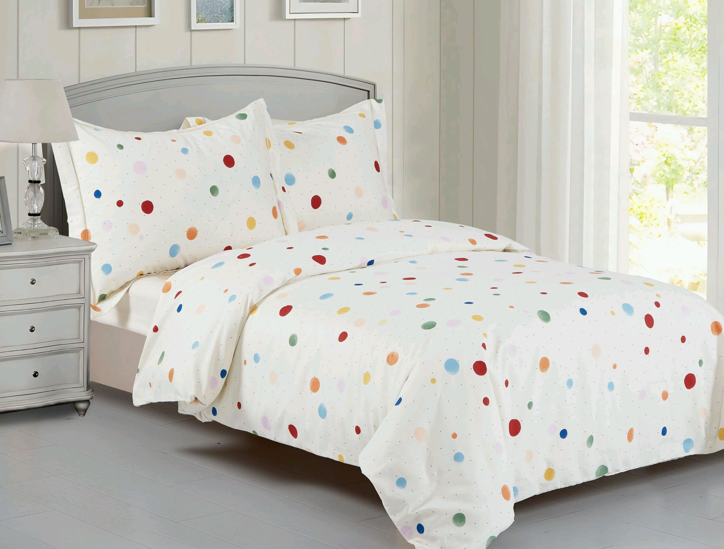 Cream duvet set with small multicoloured polka dots and matching shams