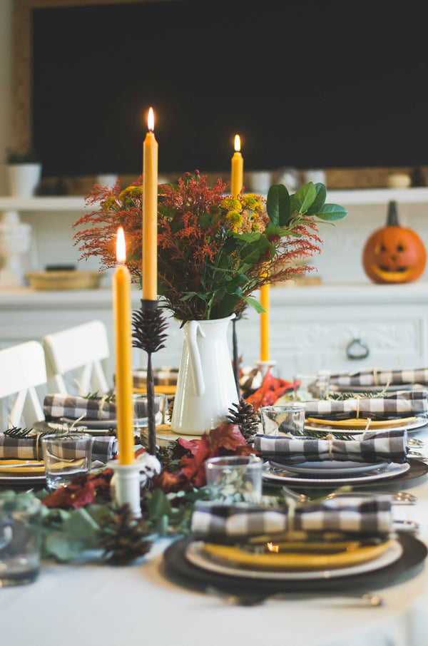 Fall Table Setting with Black and White Checkered Plates and Candles.