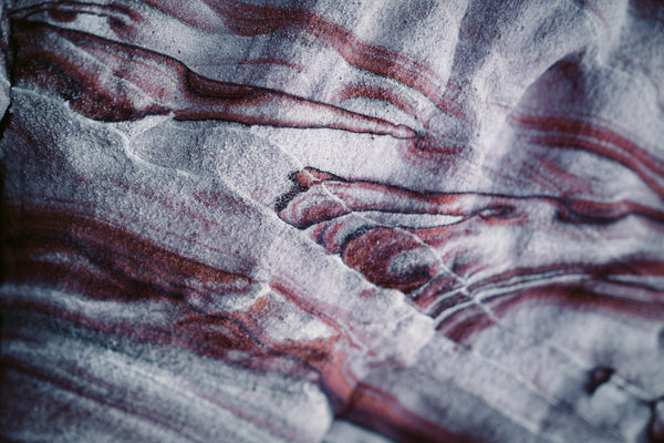 Red Marble Stone with Unique Veining Patterns and Textures.