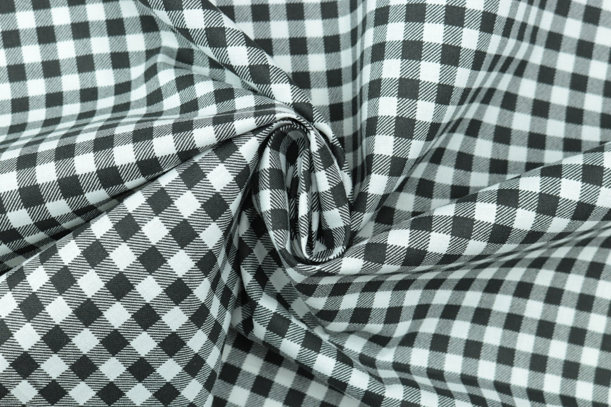 Black and white gingham fabric featuring a classic check pattern.