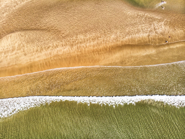 Beach Waves and Sand Patterns showcasing natural textures and colors.