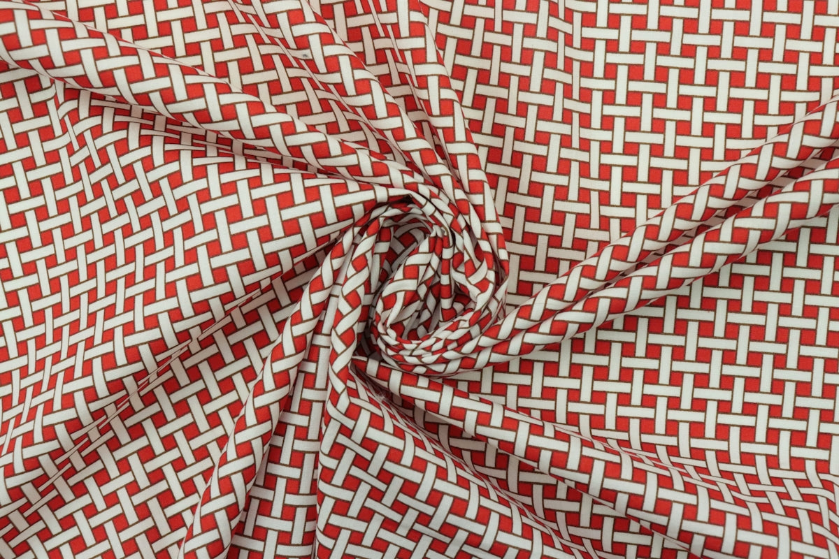 Red Woven Fabric featuring a white grid pattern, ideal for crafting and sewing projects.