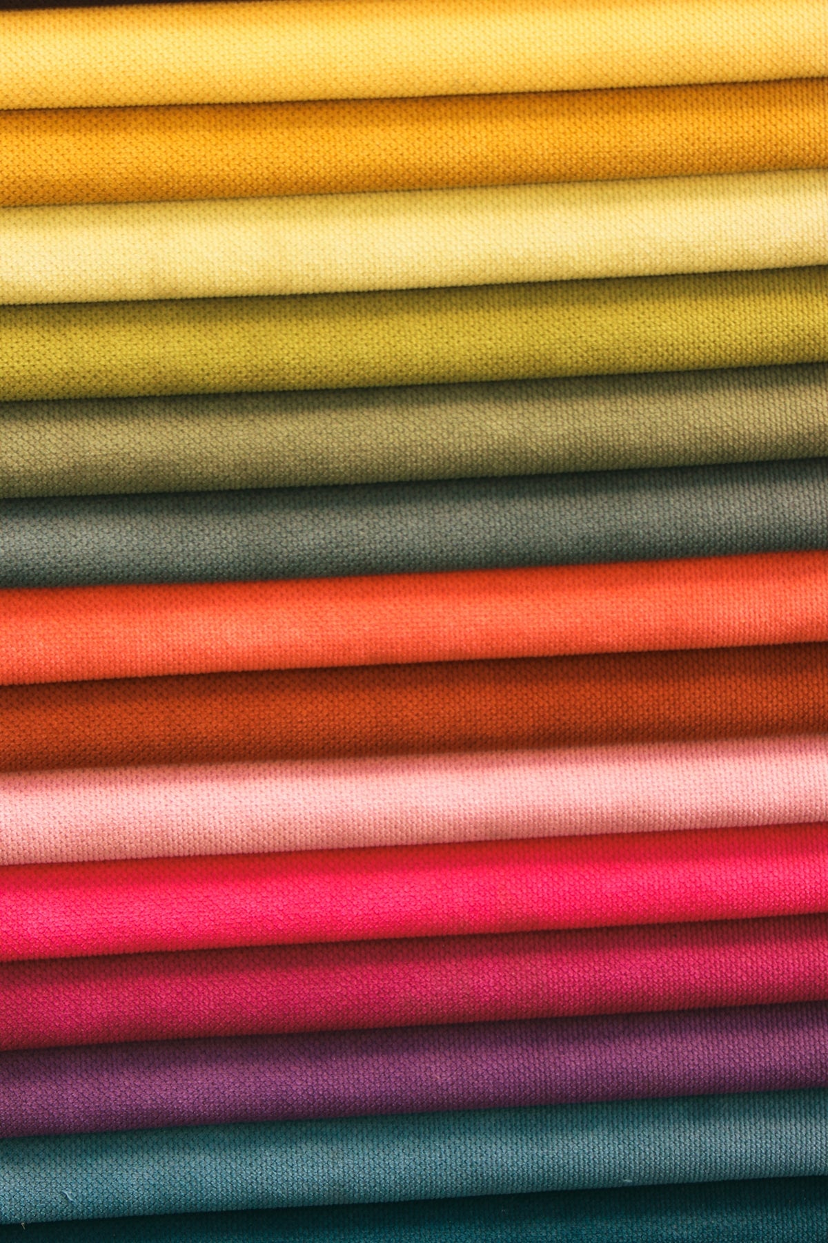 a close up of a red and yellow striped fabric