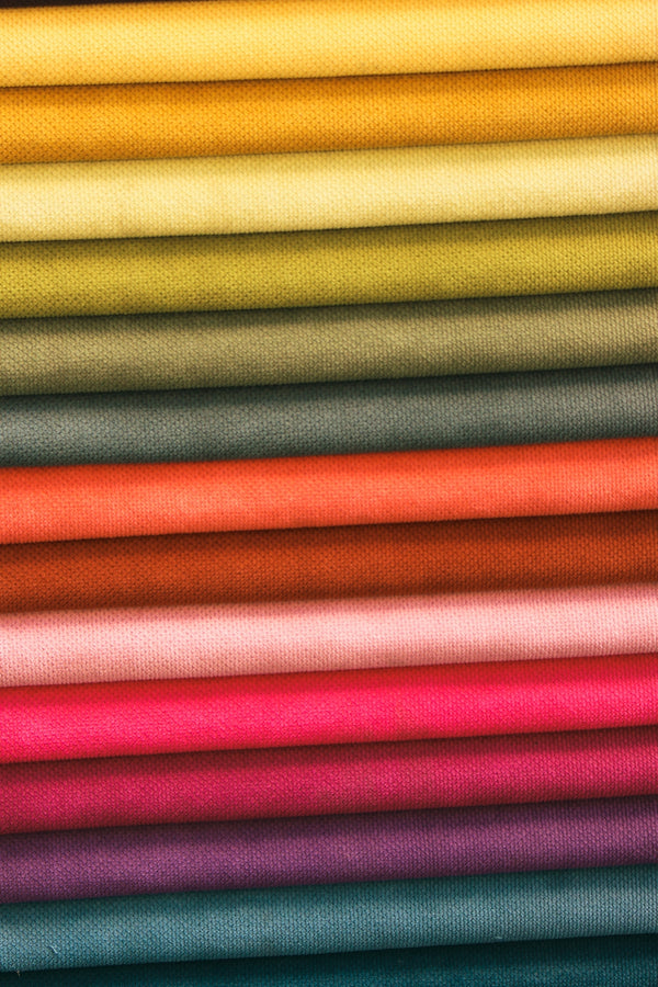 a close up of a red and yellow striped fabric