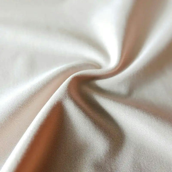 Silk Fabric - smooth and luxurious texture in cream color.
