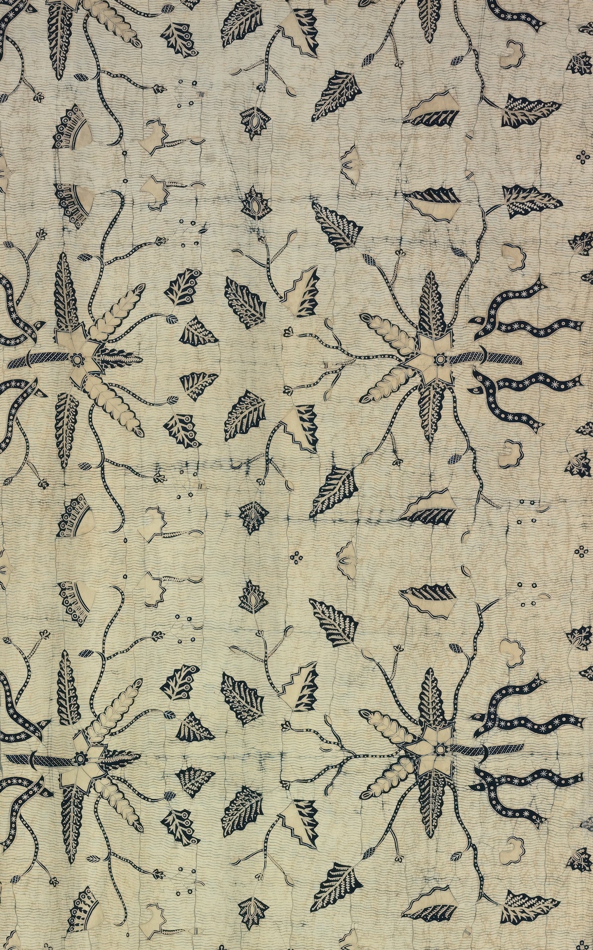 Floral Block Print Fabric featuring intricate black designs on a beige background.