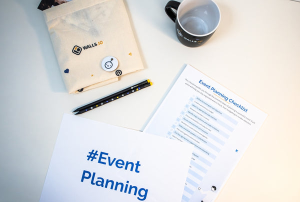 #Event Planning checklist with a pen and mug on a desk, featuring a stylish design.