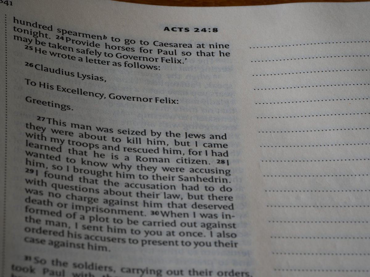A close up of an open book on a table
