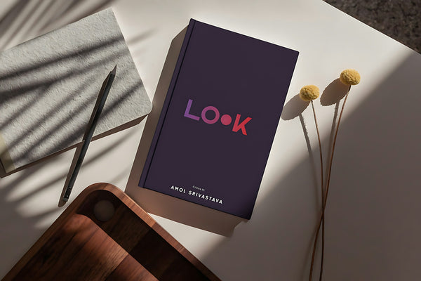 A book with the word look on a table