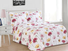 White cotton duvet set printed with red, pink and yellow blooms on tall trailing stems, matching shams