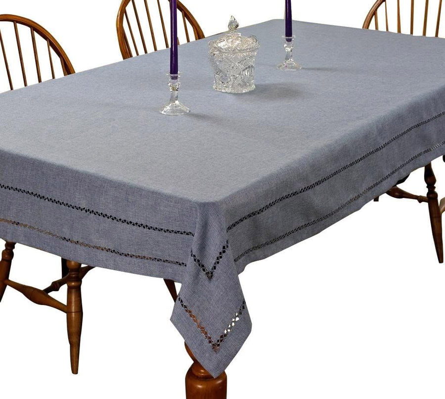 Grey hemstitch tablecloth with an open drawn-thread ladder border on a dining table