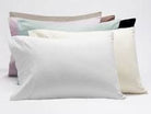 Pair of cotton sateen pillowcases in soft neutral colours