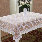 Champagne satin tablecloth with a white floral lace overlay and a scalloped white lace border