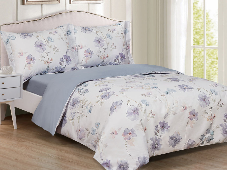 White cotton-sateen duvet set printed with watercolour lavender, blush and blue flowers, grey reverse