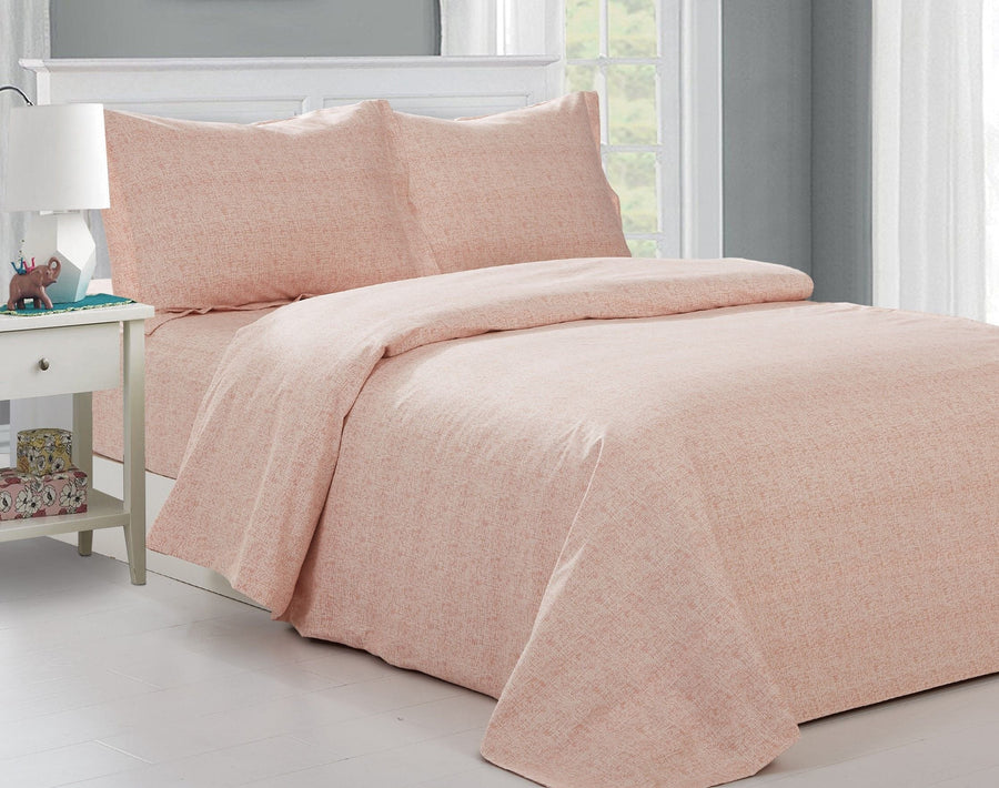 Soft peach cotton duvet set with a fine tonal crosshatch texture and matching shams