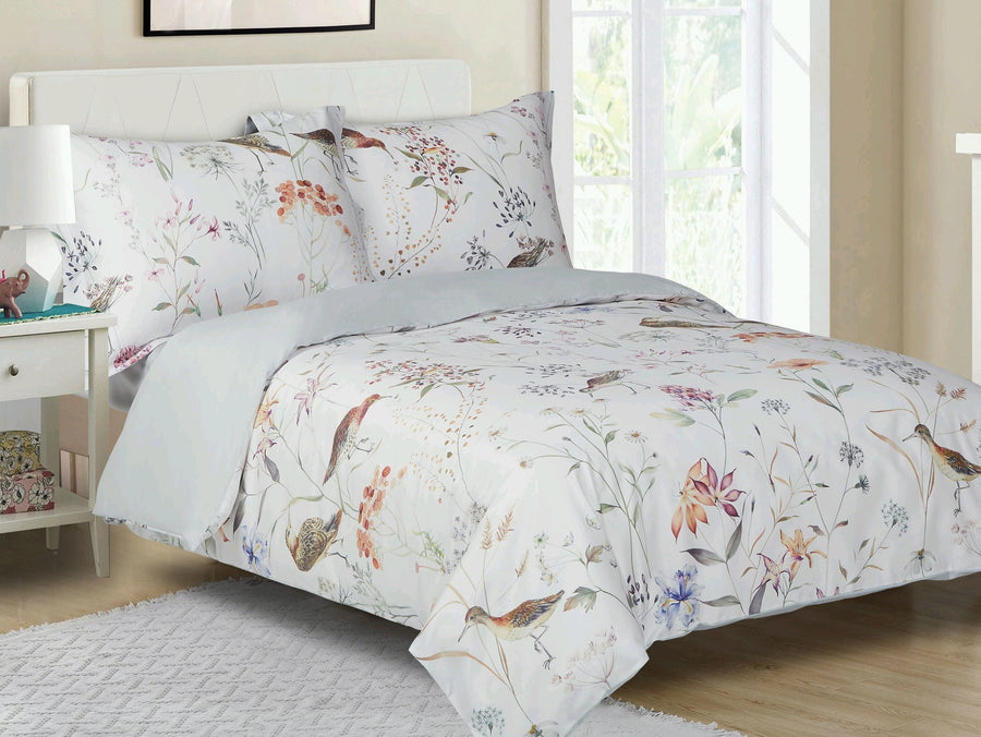 White cotton-sateen duvet set printed with wildflowers and small birds, grey reverse, matching shams