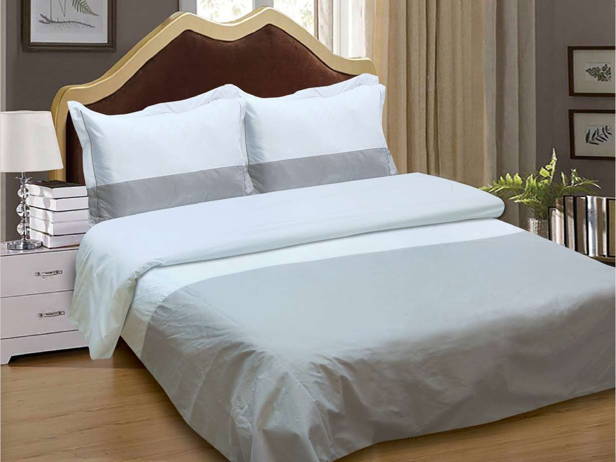 White cotton-sateen hotel duvet set with a grey accent band across the shams