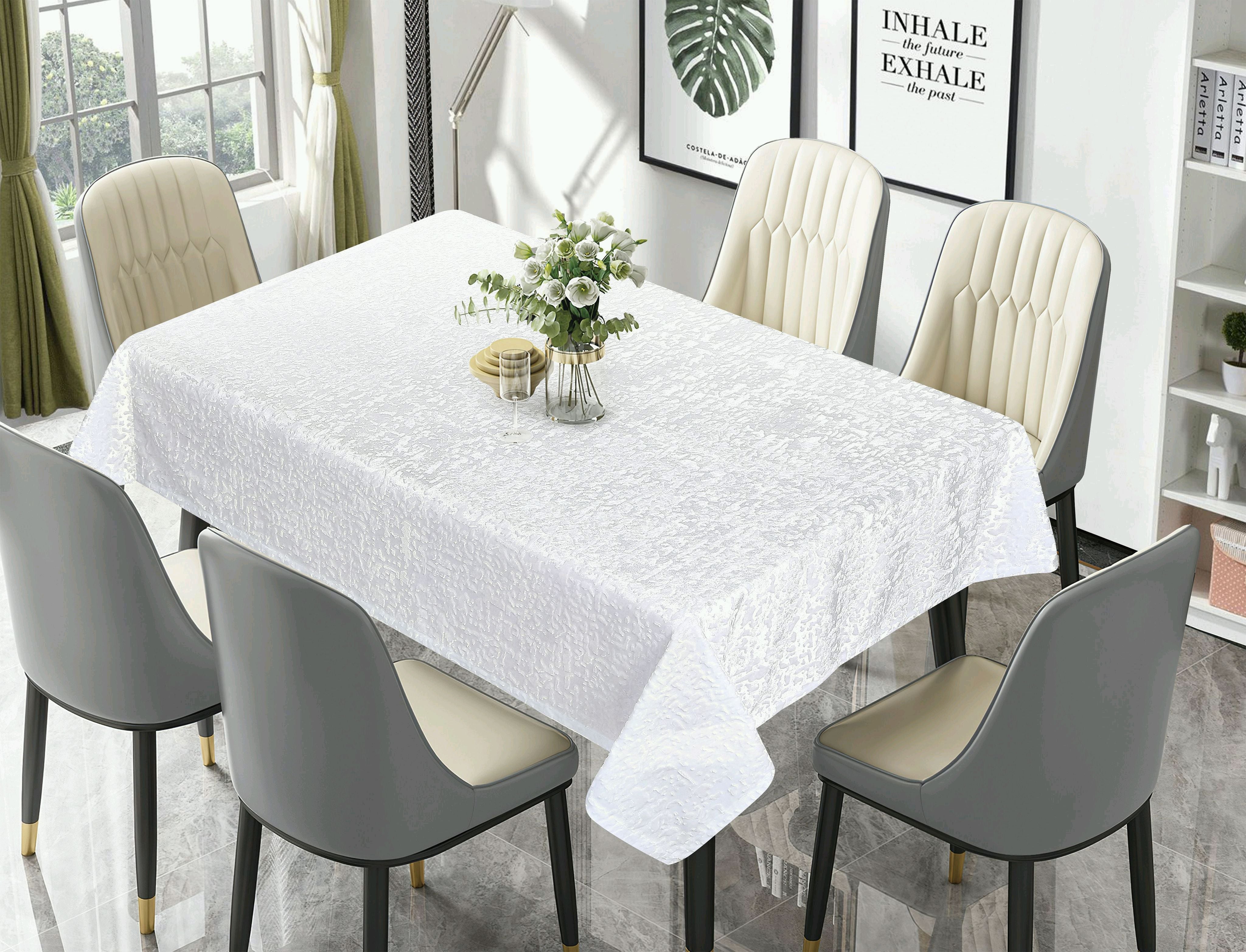 White brushed-velvet tablecloth with a soft crushed sheen on a rectangular dining table