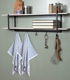 White dishtowels with woven blue chain stripes