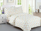 Cream cotton kids' duvet set printed with small coral, gold and green hearts, with matching shams