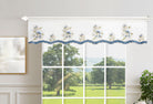 White sheer valance embroidered with white-and-blue blossoms and a blue scalloped border