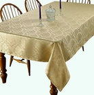 Gold damask tablecloth with a woven tone-on-tone floral pattern