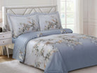 Blue-grey cotton sateen duvet set with a cascading branch-and-blossom print and two matching shams