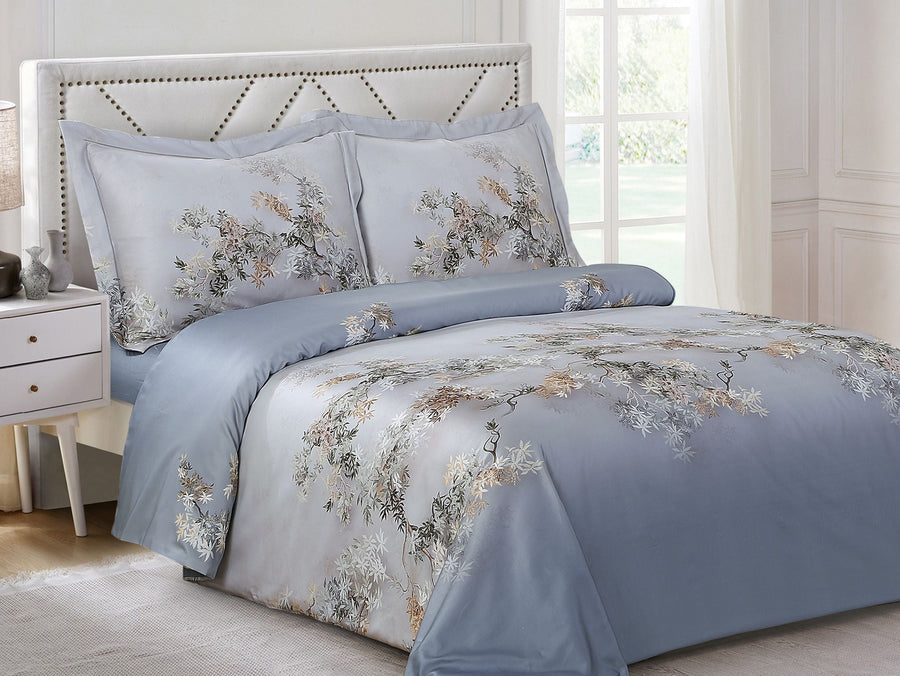 Blue-grey cotton sateen duvet set with a cascading branch-and-blossom print and two matching shams