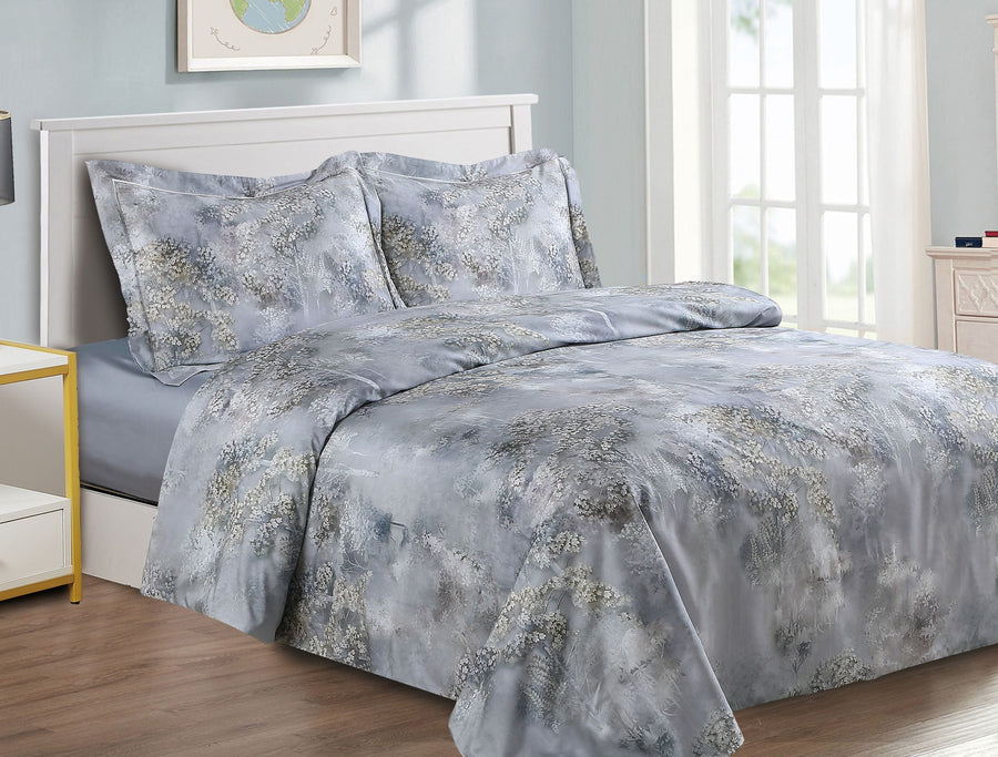 Blue-grey cotton-sateen duvet set printed with dense clusters of small white blossoms, matching shams