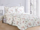 Ivory cotton duvet set printed with blush hydrangeas, small red blooms and grey-green ferns, matching shams