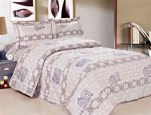 Beige quilt with a mauve damask medallion pattern and matching shams
