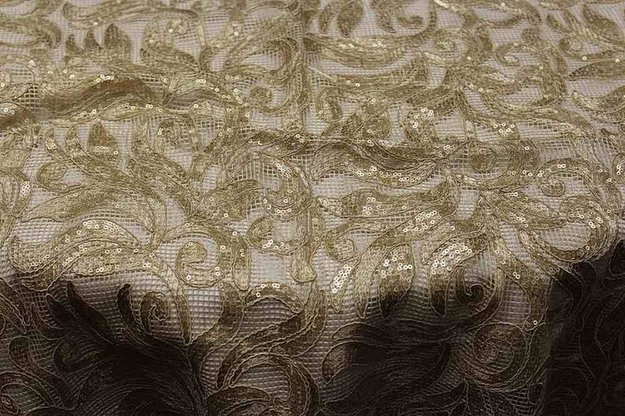 Gold Lace Tablecloth featuring intricate floral patterns and elegant design.